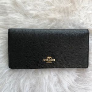 Coach black checkbook cover